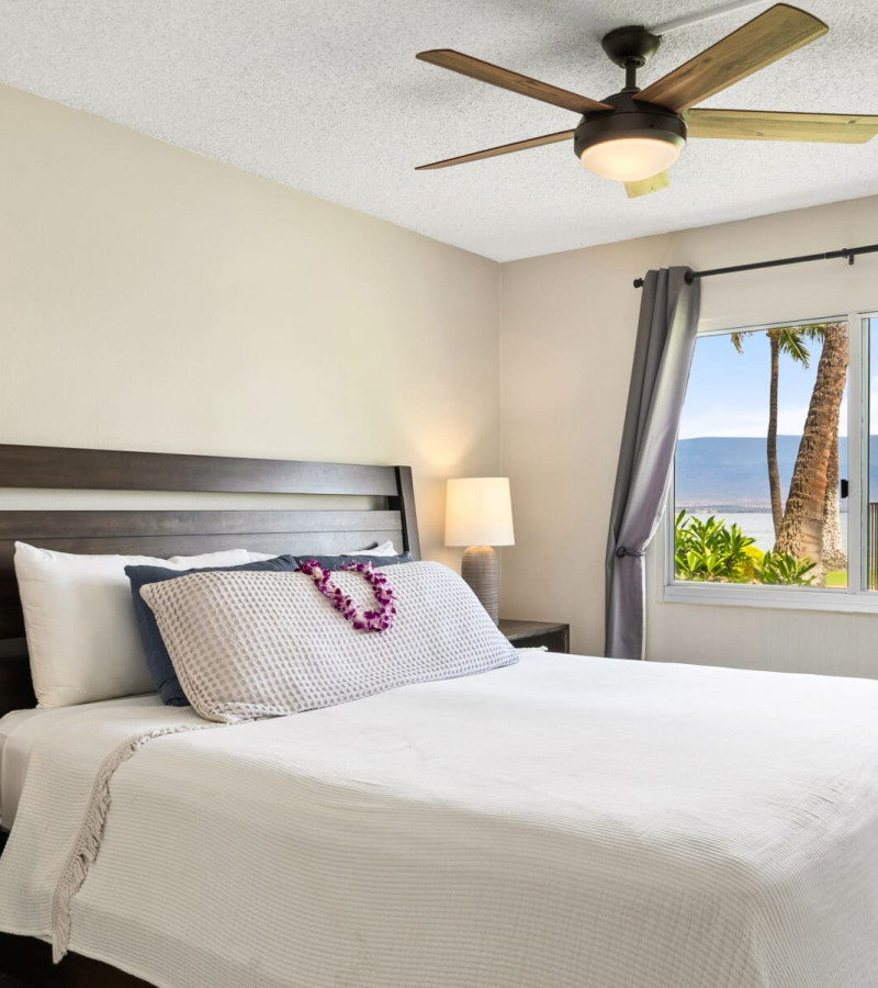 Oceanview bedroom with king bed and lanai at Maui vacation rental